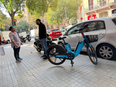 Street life in Barcelona, Spain. Bird electric rental bicycle in the streets of Barcelona.のeditorial素材