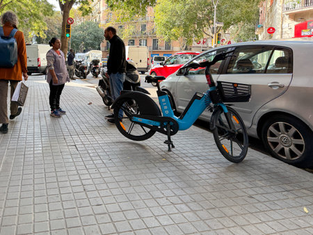 Street life in Barcelona, Spain. Bird electric rental bicycle in the streets of Barcelona.のeditorial素材