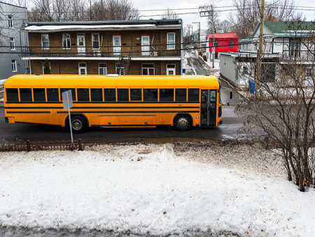 School bus on the street in winter. Quebec, Canadaの写真素材