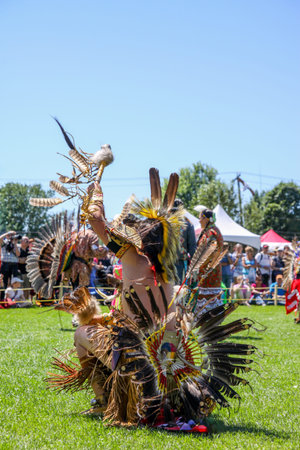 Native american in traditional costume at the annual Pow Wow, Quebec, Canada.