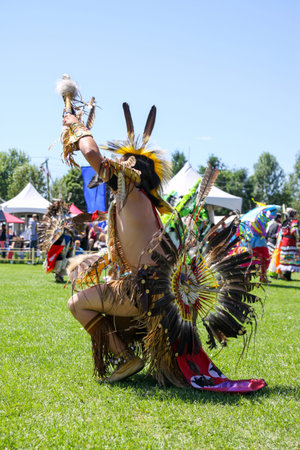 Native american in traditional costume at the annual Pow Wow, Quebec, Canada.