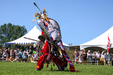 Native american in traditional costume at the annual Pow Wow, Quebec, Canada.