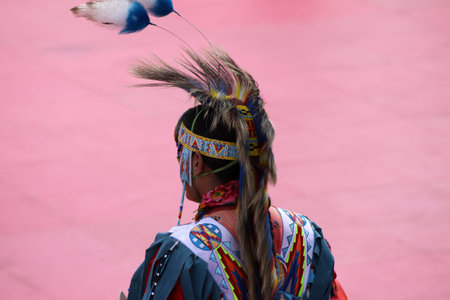 A Native American man in traditional costume during the annual festival in Quebec, Canada.