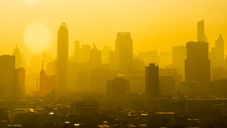 Heatwave over a big city full of skyscrapers, yellowish atmosphereの写真素材