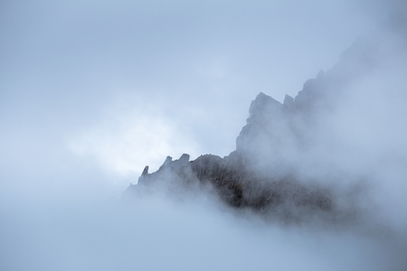 Mount peak in a clouds in Sichuan , Chinaの写真素材