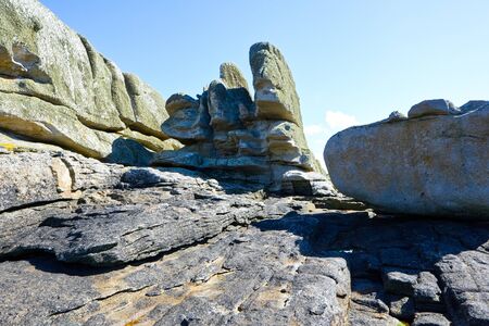 Big rocks at the coast of Brittany, special formation, sunlightの写真素材