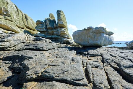 Big rocks at the coast of Brittany, special formation, sunlightの写真素材