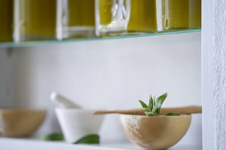 beautiful and nice closeup of a bowl detail blurred in kitchen shelf house bottles oil living home ,medicine alchemist pharmacy healthの写真素材
