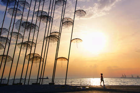 Umbrellas, a modern artwork at the waterfront of Thessalonica - Greeceの写真素材