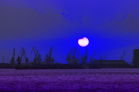 Moonset in the Harborの写真素材