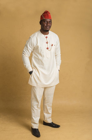 Yoruba Culturally Dressed Business Man with Hands in His Pocket Posing and posingの写真素材