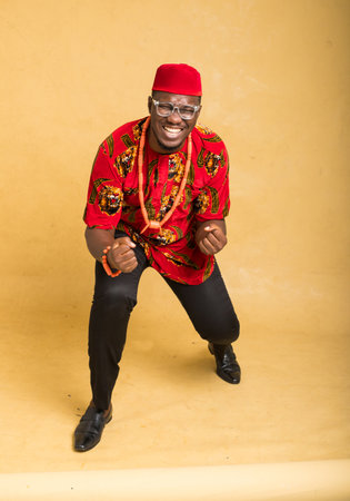 Igbo Traditionally Dressed Business Man in Glasses Looking Fineの写真素材