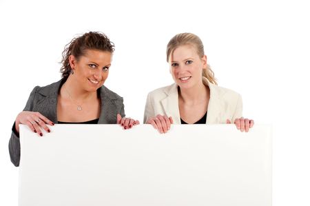 Two young business women hold space for text in handの写真素材