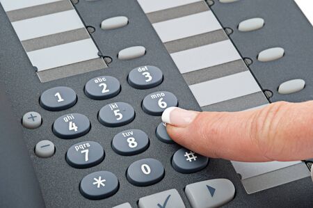 Close-up of phone on a white backgroundの写真素材