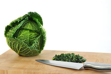 Savoy cabbage released on a white backgroundの写真素材