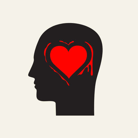 Black silhouette of a human head in profile with a red heart in the brain area.のイラスト素材