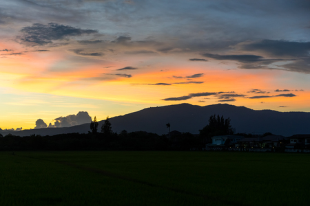 The sky is colorful with clouds at sunset.の写真素材