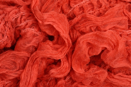 close up red knitted scarf backgroundの写真素材