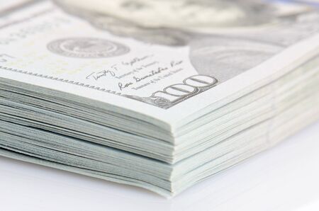 close up bundle of hundred dollars bank notesの写真素材