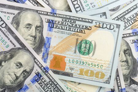 close up hundred dollars bank notes backgroundの写真素材