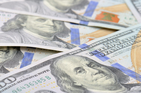 close up hundred dollars bank notes background