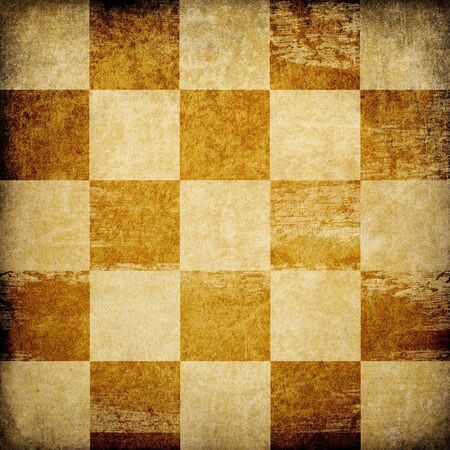 Grungy chessboard stained background.の写真素材
