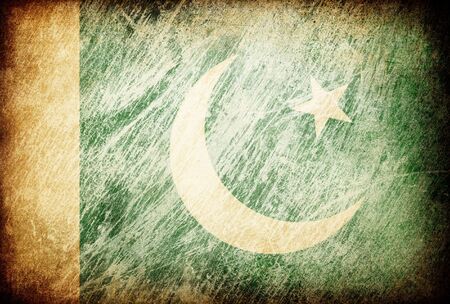 Grunge rubbed flag series of backgrounds. Pakistan.の写真素材