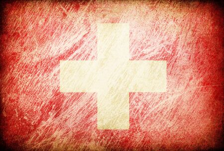 Grunge rubbed flag series of backgrounds. Switzerland.の写真素材
