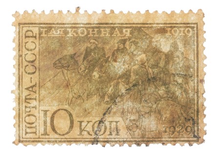 RUSSIA - CIRCA 1930s: stamp printed in Russia, shows riders of the First Cavalry Army, dedicated to the celebration of a decade, circa 1930sの写真素材