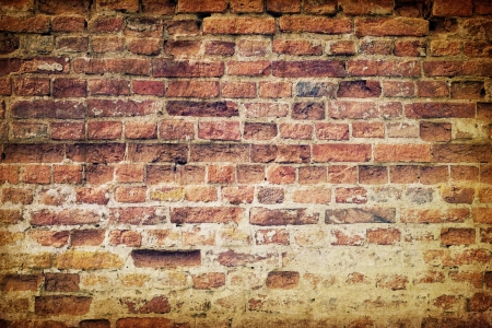 Vintage old weathered brick wallの写真素材
