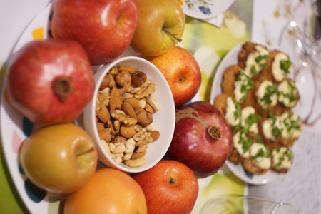 Healthy eating concept. Apples, nuts and cookies on the tableの写真素材