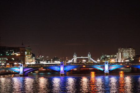 View of London and Thames River at night with backlight, UKの写真素材