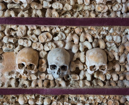 Wall of human bones in the Igreja do Carmo chapel, Faro, Portugalの写真素材
