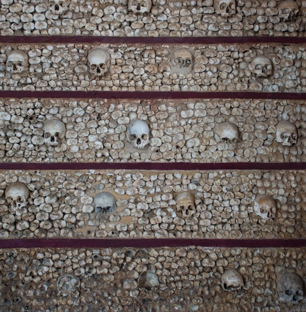 Wall of human bones in the Igreja do Carmo chapel, Faro, Portugalの写真素材