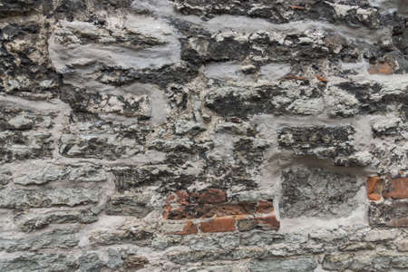 Rough ancient brick wallの写真素材