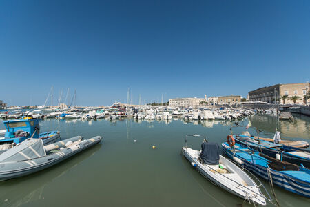 Boats moored in port. Trani. Apulia, Italy.の写真素材