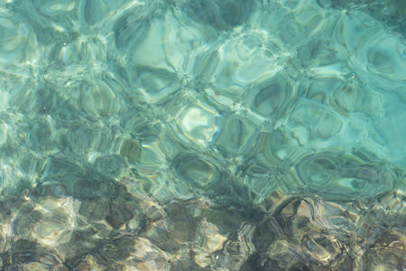 Blue clear sea surfaceの写真素材