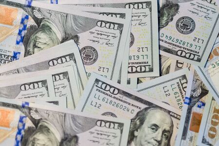 Lots of hundred-dollar bills background. The new sample.の写真素材