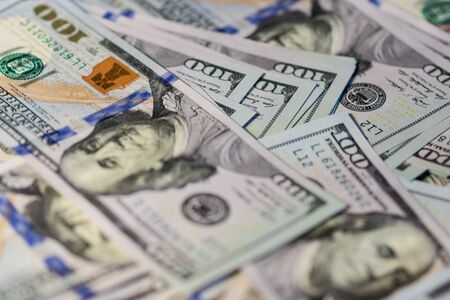 Lots of hundred-dollar bills background. The new sample.の写真素材