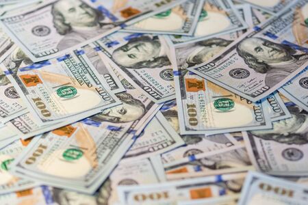 Lots of hundred-dollar bills background. The new sample.の写真素材