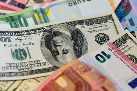 Dollars and euro for a backgroundの写真素材