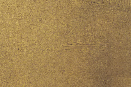 Wall painted in yellow textureの写真素材