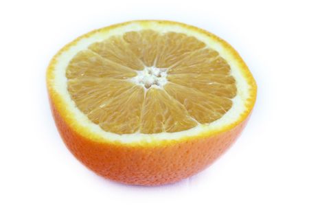Half cutted orange isolated on whiteの写真素材