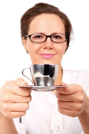Smiling woman with cup of coffee in hands, closed-up portrait on whiteの写真素材