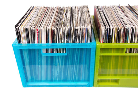 Old dj records in plastic boxes, closed-up in studio
