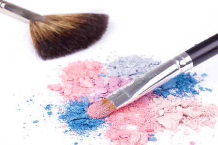 Crumbled colour eyeshadows with make-up brushの写真素材