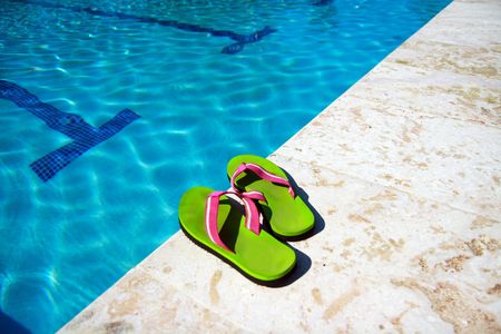 Slippers near swimming pool の写真素材