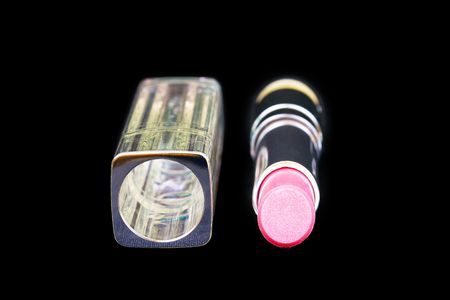Pink lipstick on black の写真素材