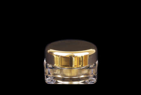 Gold jar on blackの写真素材