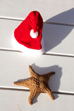 Caribbean christmas hat on wooden tableの写真素材